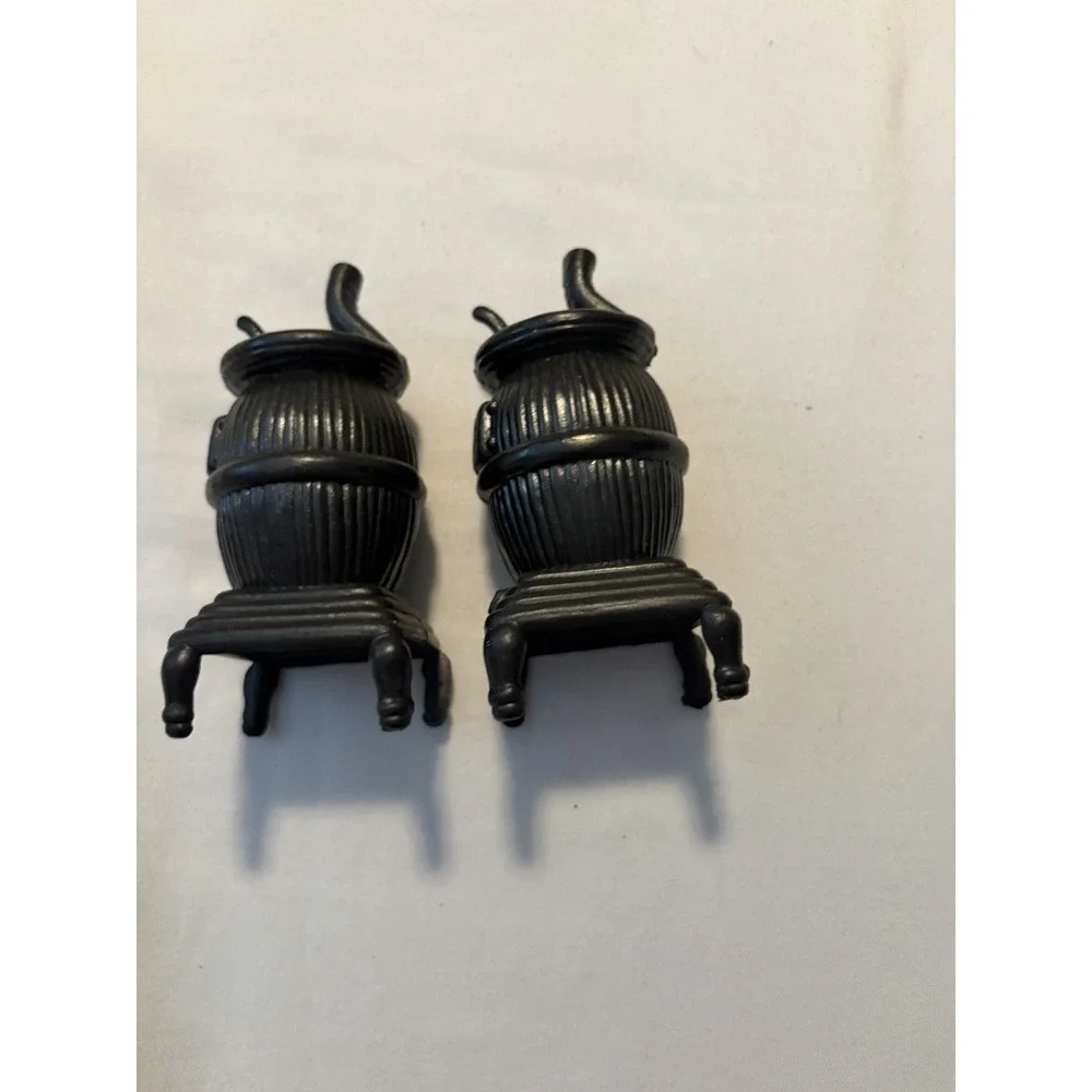 Salt and Pepper Shakers Potbelly Stove Vintage Black Gold Plastic Novelty